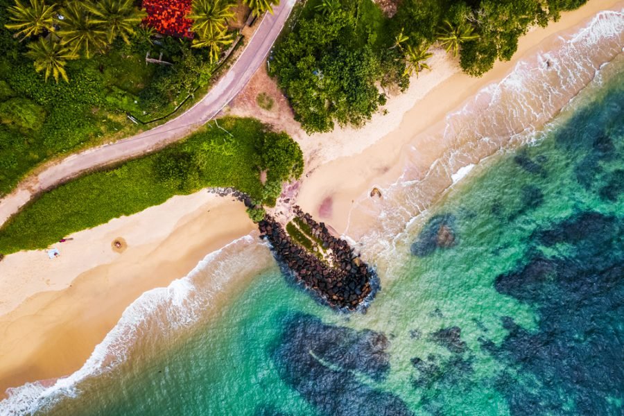 Golden beach and reef from above