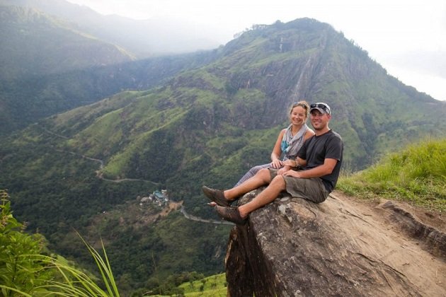 Couple resting on a peak near Ella